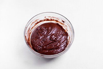 Chocolate dough to make crinkle cookies in the glass bowl. Step 7