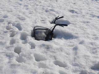 Naklejka premium A bicycle covered with fresh snow in Hokkaido after Snowstorm.