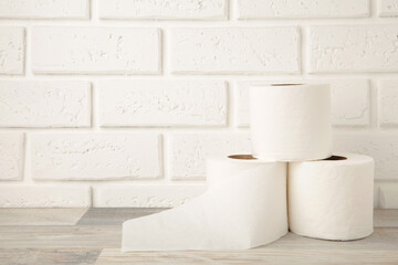 Toilet paper close-up on white background with copy space