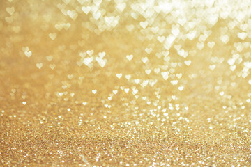 Golden heart bokeh background
