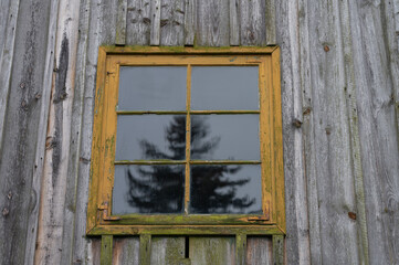 old colored window with shutter