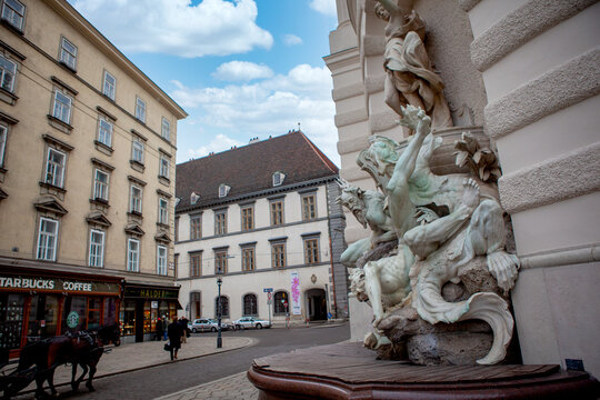 VIENNA, AUSTRIA - 02 January 2011: Sculpture fountain Power of sea Michaelerplatz near Hofburg in Vienna. Famous landmark of Vienna.