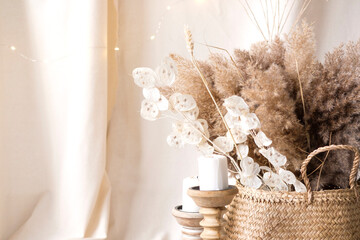 Pampas grass and lunaria are collected in a bouquet for room decor. Bouquet of dried flowers....