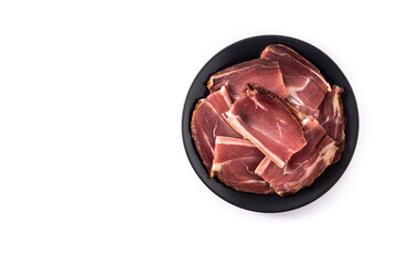 Dried and smoked meat slice isolated on white background.Top view