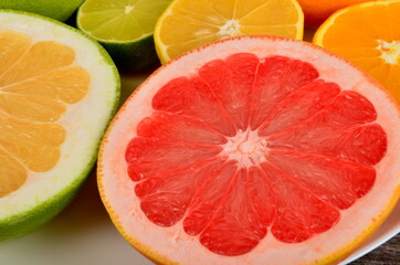 Close-up of sliced citrus fruits, Various citrus fruits, Citrus background