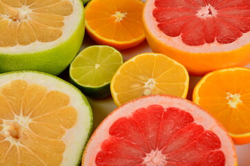 Close-up of sliced citrus fruits, Various citrus fruits, Citrus background