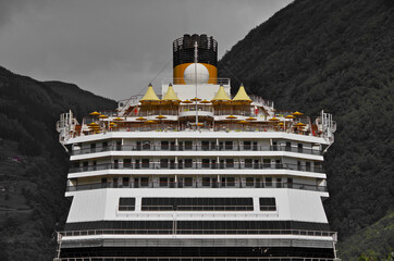 Huge Costa cruiseship or cruise ship liner Favolosa in Norwegian Geirangerfjord in Norway with...