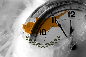 Cyprus, Cypriot flag with clock close to midnight in the background. Happy New Year concept