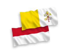 National vector fabric wave flags of Indonesia and Vatican isolated on white background. 1 to 2 proportion.