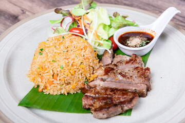 Fried Crispy Pork  On a white plate- Thai food style

