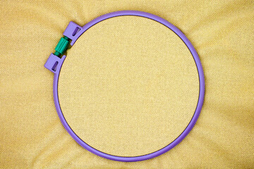 Linen crossstitch fabric in plastic embroidery hoop © rosinka79