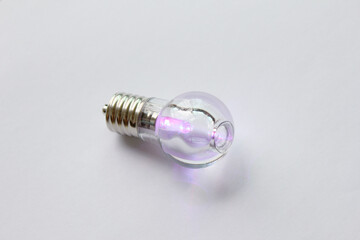  mini light bulb isolated on white background. pink color lighting.