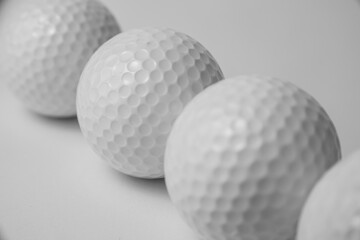 golf club and ball on white background