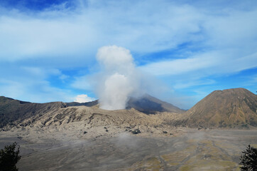 volcano smoke up in the sky 