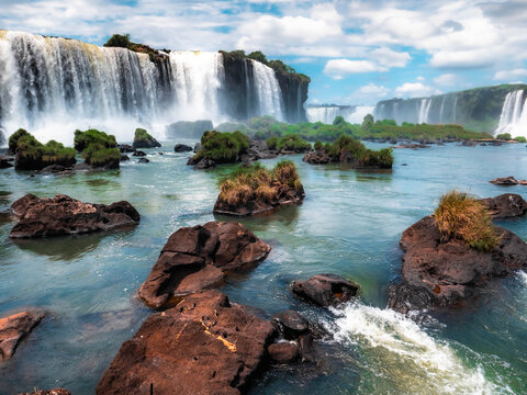 waterfall and rocks iguazu falls © Dmitrii