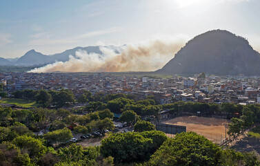 Fire in the forest near the favela (Rio das Pedras), Rio de Janeiro, Brazil
