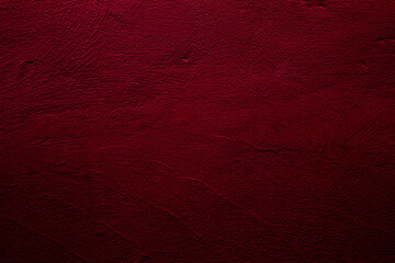 Crimson abstract textured wall background in red