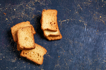 crispy rusk, cake rusk over Dark background