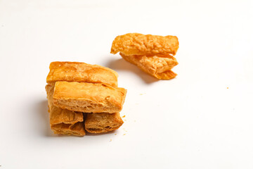 indian khari or kharee or salty Puff Pastry Snacks in wooden bowl
