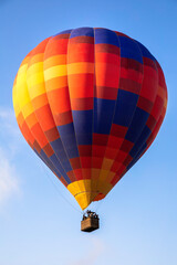 Colorful hot air balloon in the blue sky