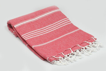 Peshtemal Turkish bath cotton towel folded textile. Beautiful bright colors with natural light...