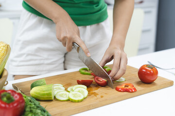 Close up woman preparing ingredient for salad menu. Dinner diet plate homemade by yourself.