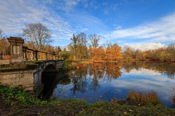 The Alexander Park during golden autumn, Pushkin city, Saint-Petersburg, Russia, orange leafs,...