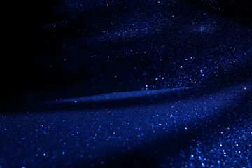 Obraz premium background of abstract glitter lights. silver, blue and black. de focused