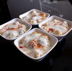 Dahi vada close up view black background