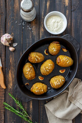 Baked potatoes with rosemary and garlic. Healthy eating. Vegetarian food.