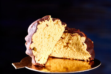 One chocolate marshmallow cut in half
