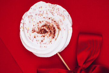 Merengue Marshmallow Zephyr on Red Background with card