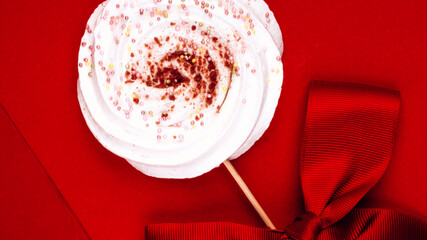 Merengue Marshmallow Zephyr on Red Background with card