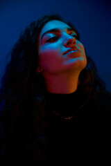 Portrait of a Brunette Woman in Rainbow Light