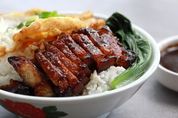 Char Siu Served With Rice In Bowl With Fried Egg And Vegetable. Chinese food, Cantonese cuisine.