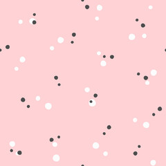 Scattered small dots. Cute seamless pattern. Simple vector illustration.