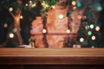 Wooden desk on christmas interior background, new year concept