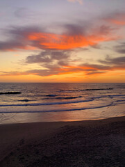 Fototapeta na wymiar Orange sunset on the sea