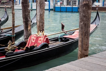 Acrylic prints Gondolas gondola near pier