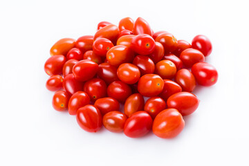 High Angle Shot Of Cherry Tomatoes Against White Background