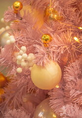 Light pink christmas tree with christmas ball