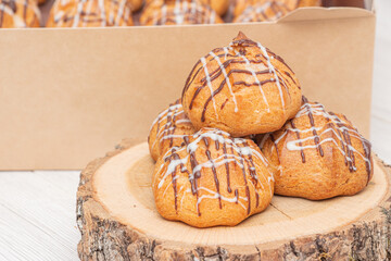 Profiteroles with white and dark chocolate filling