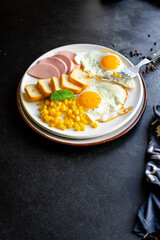 breakfast fried egg, bread toast, vegetables, corn, cheese and more on the table serving healthy meal snack ingredient top view copy space for text food background rustic