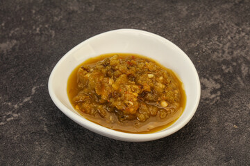 Green spicy sauce in the bowl