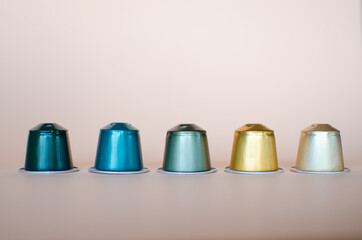 Coffee capsules with Cold Colored scale.