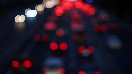 Abstract city street and car lights blur, bokeh background with white and red lights