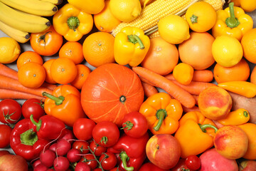 Assortment of organic fresh fruits and vegetables as background, closeup
