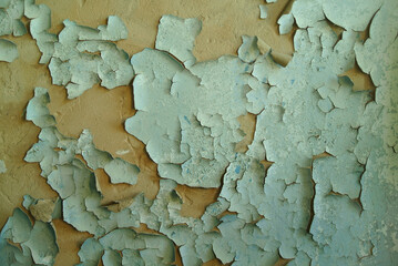 Old peeling paint on the wall. Abstract background