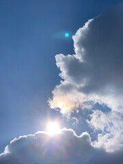 sun and moon in blue sky with clouds  fhuy1