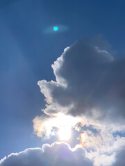 sun and moon in blue sky with clouds  fhuy1